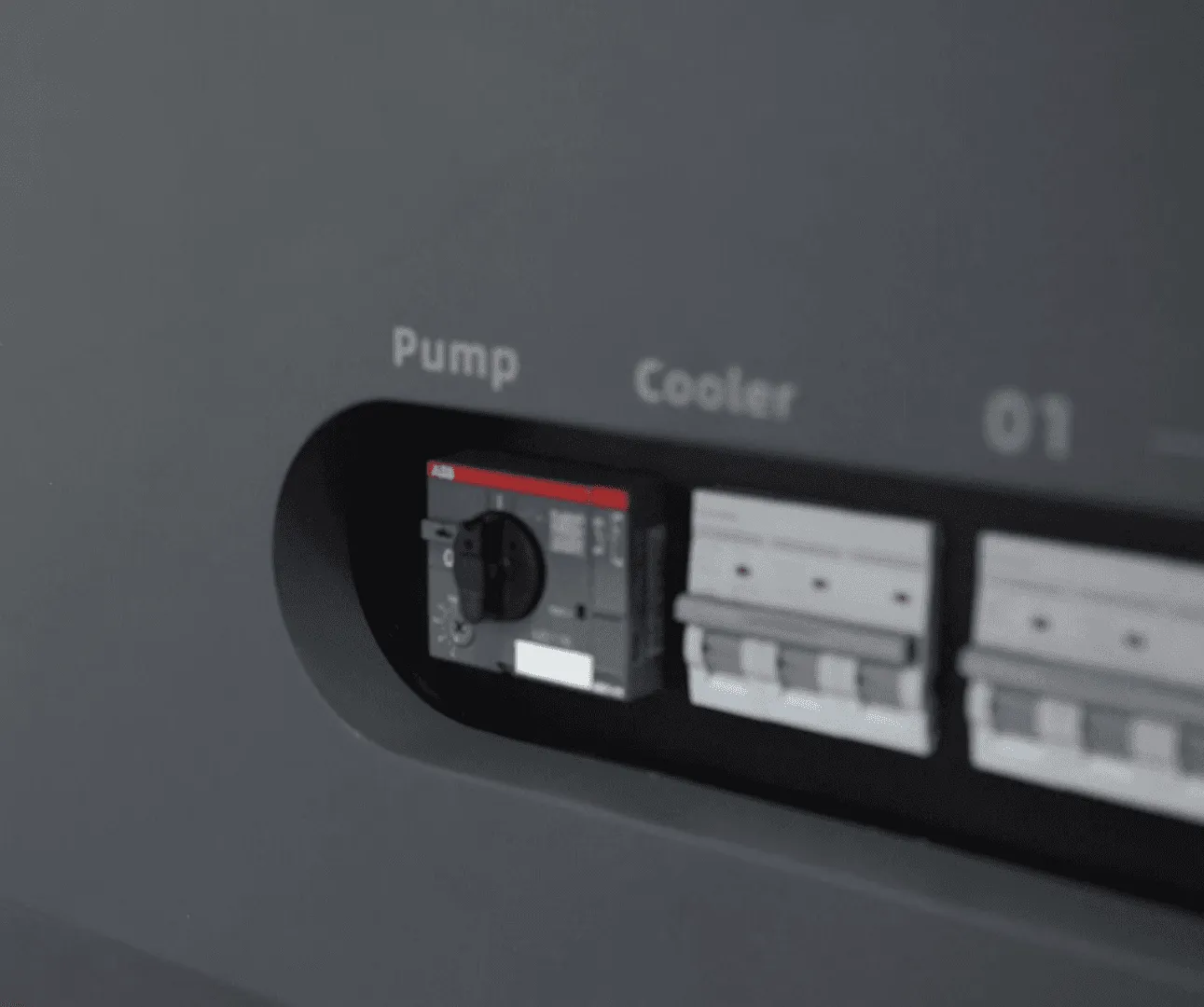 Per-circuit breakers labelled Pump, Cooler and 01 upward
