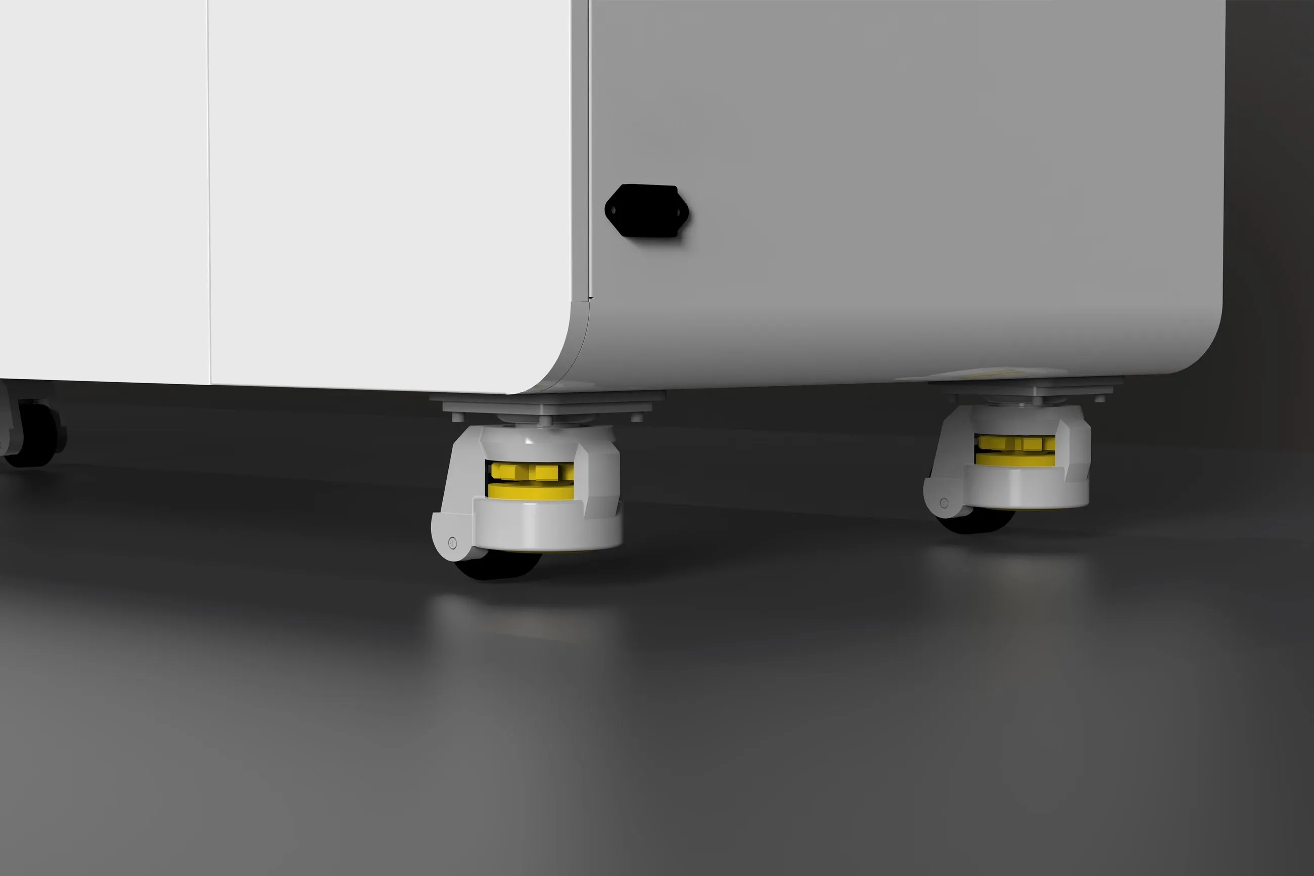 Close-up of the swivel casters under the tank