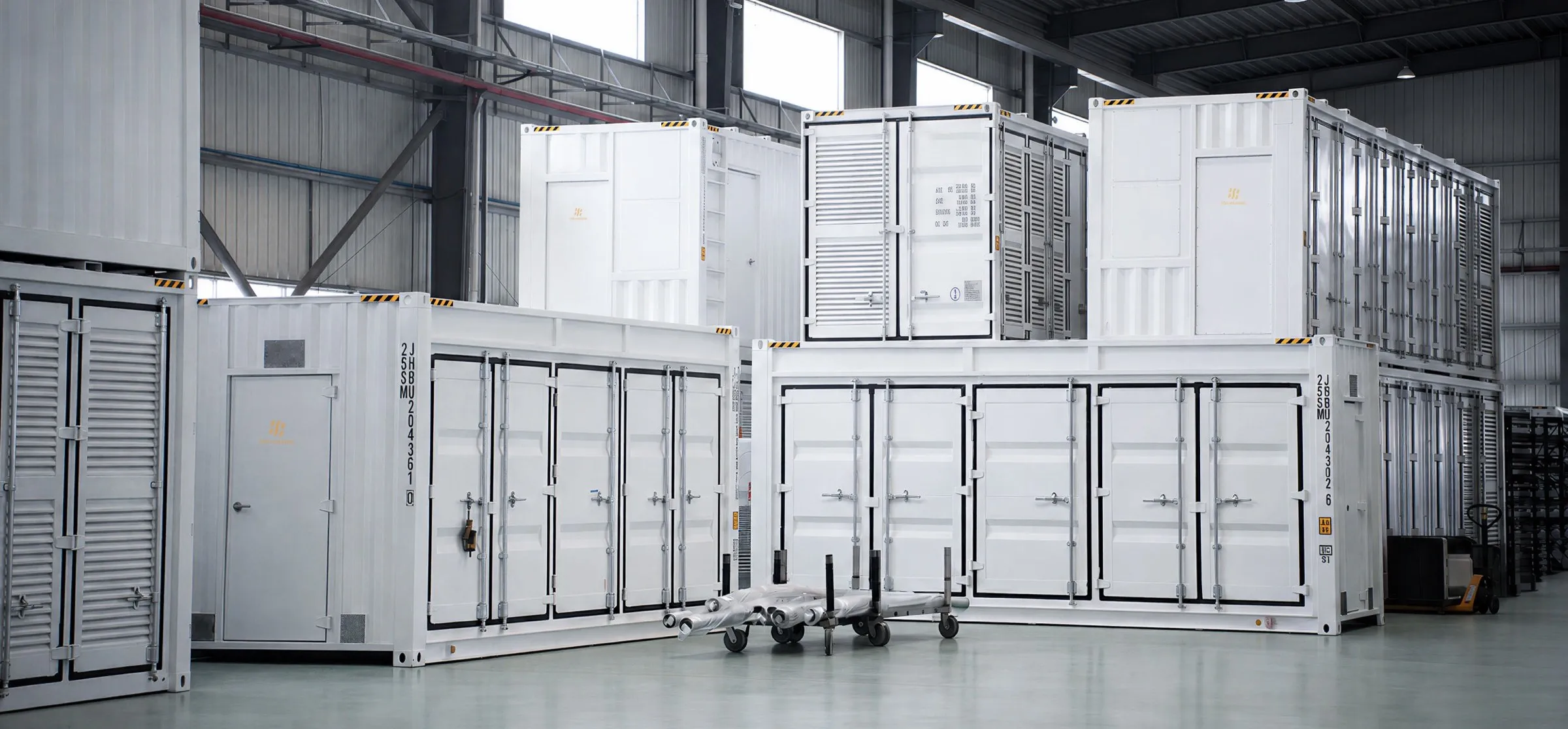 Finished Fog containers stacked in the production hall, doors closed and ready to ship