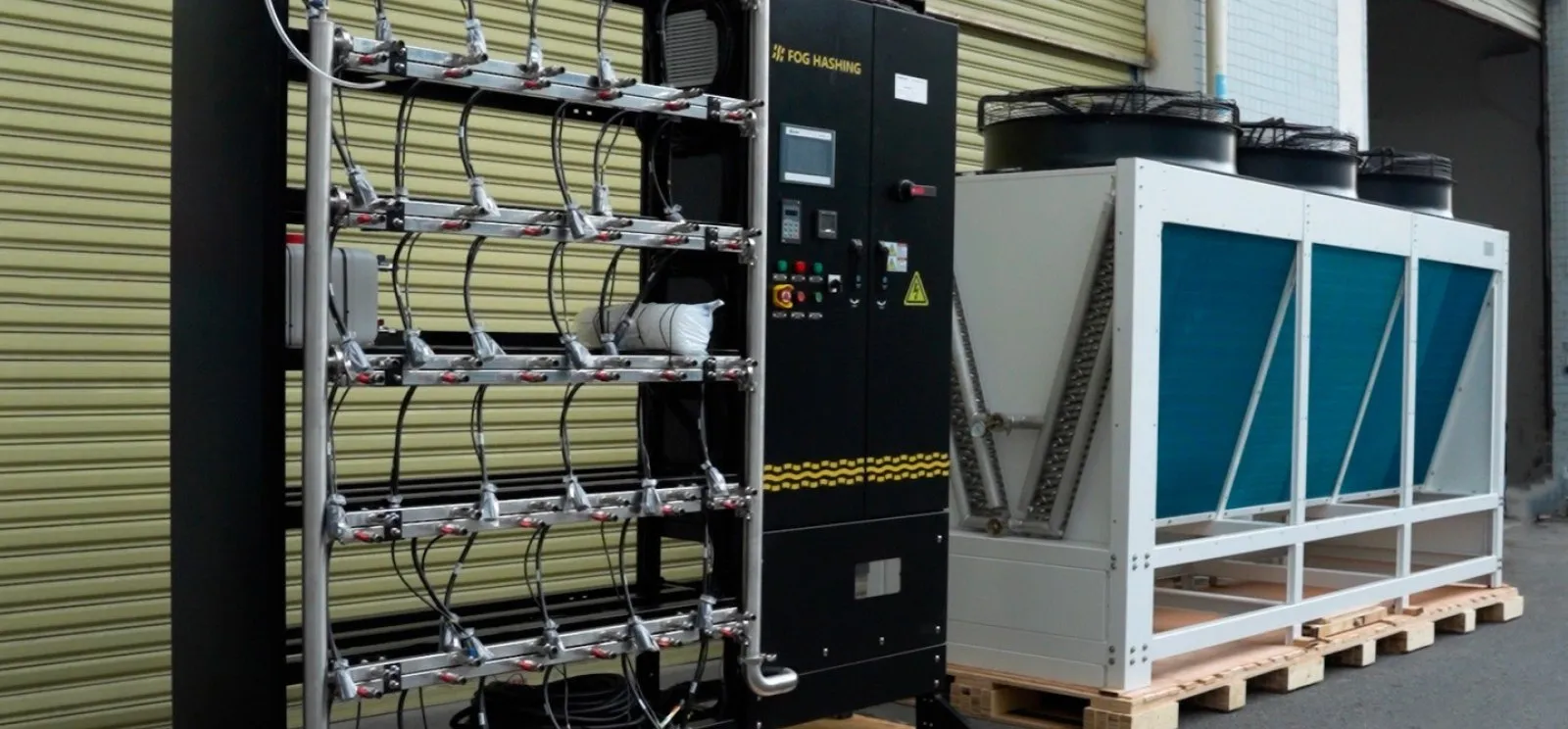 An H200-S rack and its dry cooler crated on pallets, ready to dispatch