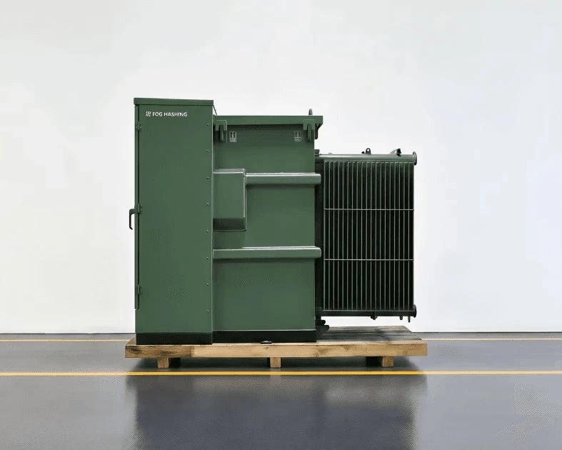 A green pad-mount transformer crated on a pallet